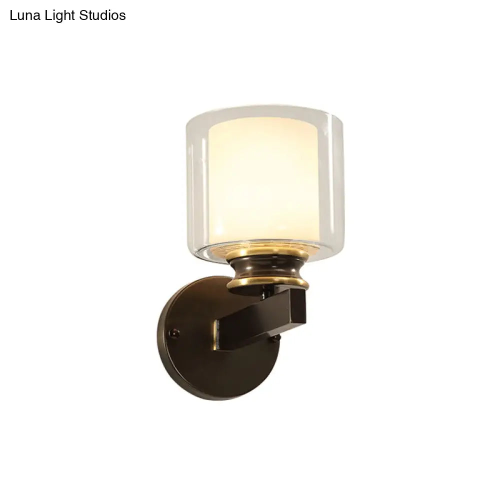 Black 1-Light Wall Sconce - Traditional Metal Cylinder With Double-Tier Glass Shade For Bedroom