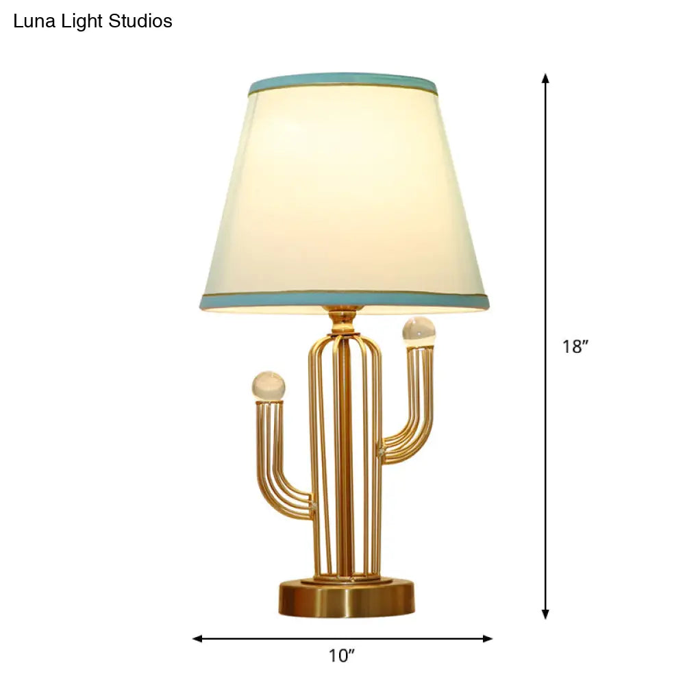 Blue Fabric Cone Night Table Lamp With Clear Crystal Orbit Decor And Metal Base
