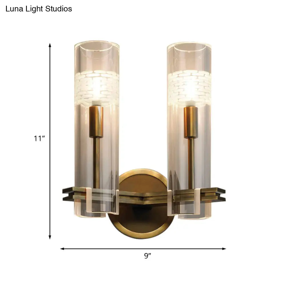 Colonialist Gold Wall Sconce With Clear Cylindrical Glass - Perfect For Living Room Lighting