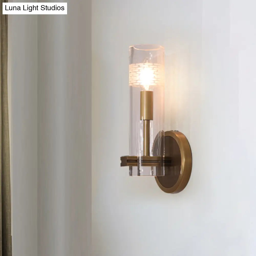 Colonialist Gold Wall Sconce With Clear Cylindrical Glass - Perfect For Living Room Lighting