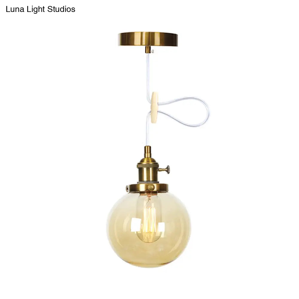Farmhouse Orbit Pendant Light With Amber/Clear Glass And Adjustable Cord In 3 Elegant Finish Options