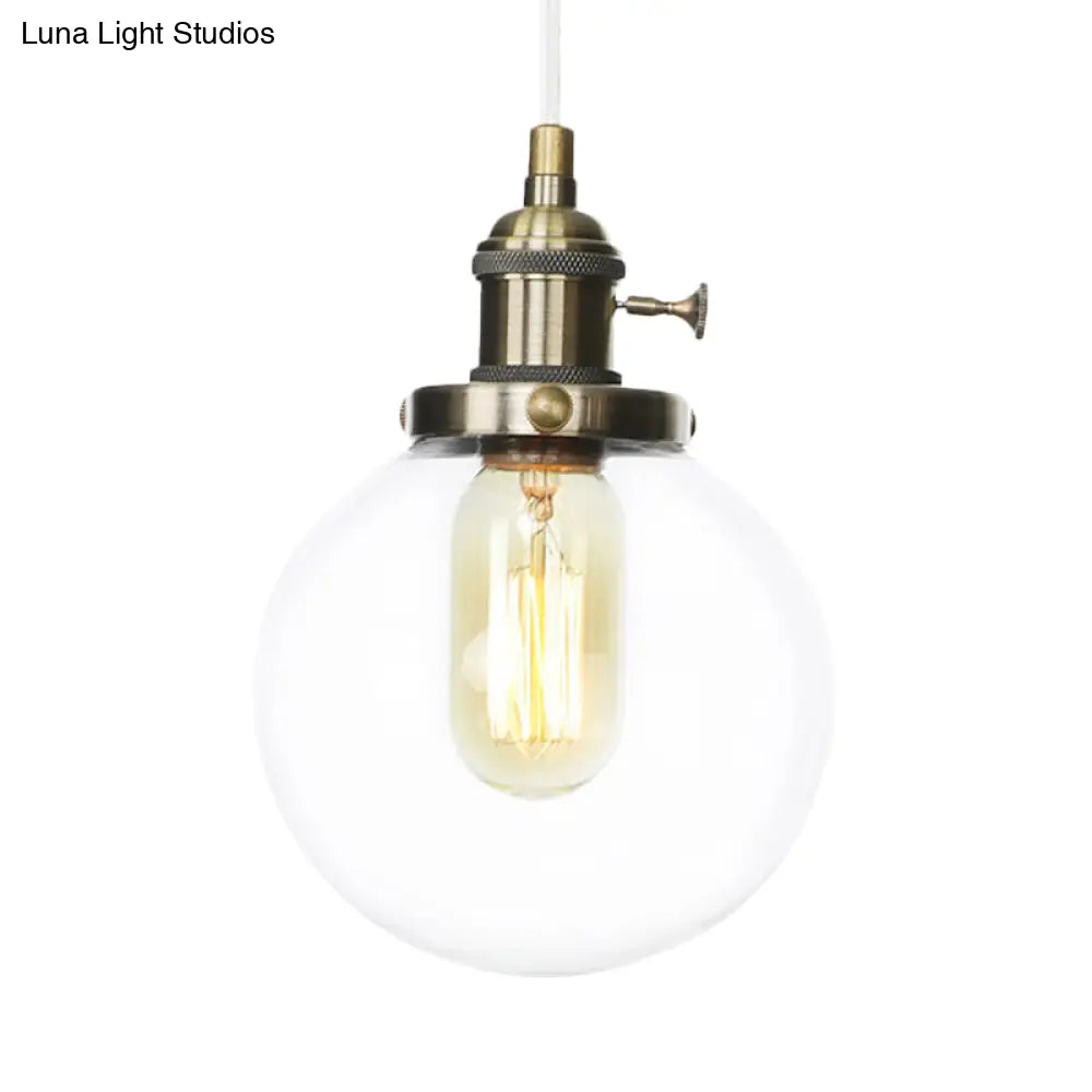 Farmhouse Orbit Pendant Light With Amber/Clear Glass And Adjustable Cord In 3 Elegant Finish Options