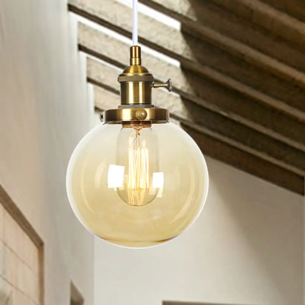 Farmhouse Orbit Pendant Light With Amber/Clear Glass And Adjustable Cord In 3 Elegant Finish