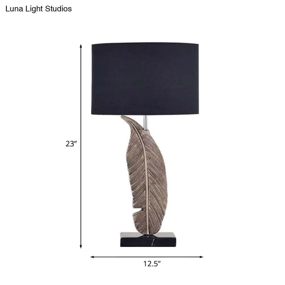 Feather Base Nightstand Lamp In Black With Classic Drum Shade For A Cozy Bedside Ambiance