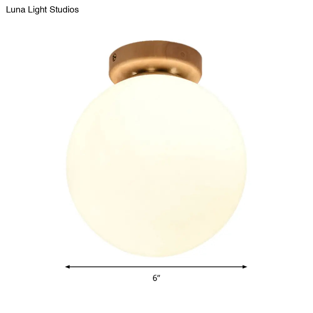 Frosted Glass Globe Ceiling Mount Light In White - Ideal For Modern Bathrooms
