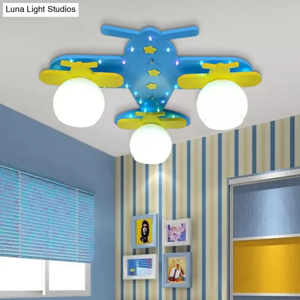 Kindergarten Ceiling Light: Cartoon Wood Flush Mount Propeller Plane Fixture - Blue (3 Bulbs)