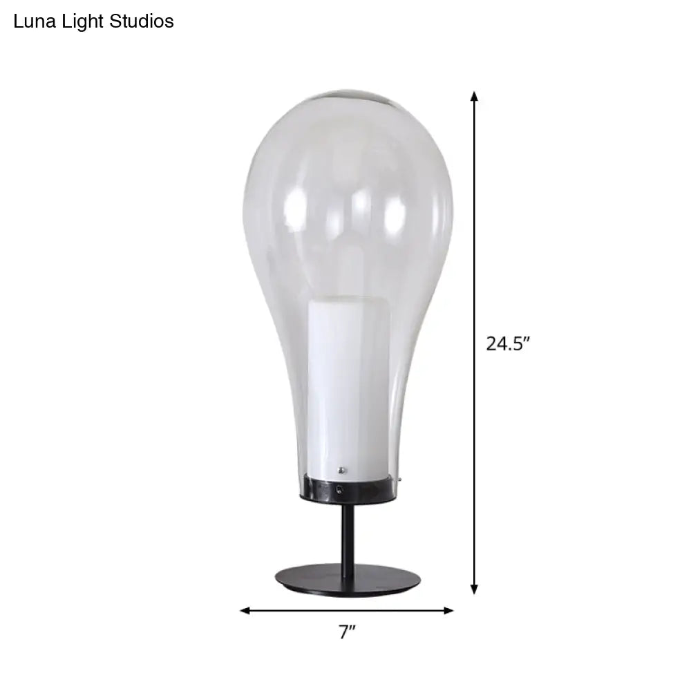 Minimalist Clear Glass Table Lamp - Compact Bulb-Shape Desk Light For Bedroom