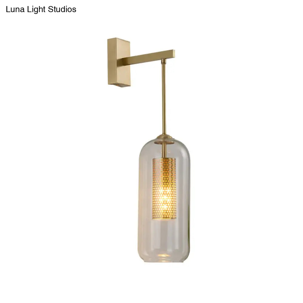 Modern 1-Head Gold Wall Mount Light For Bedside - Clear Glass Capsule Sconce Fixture