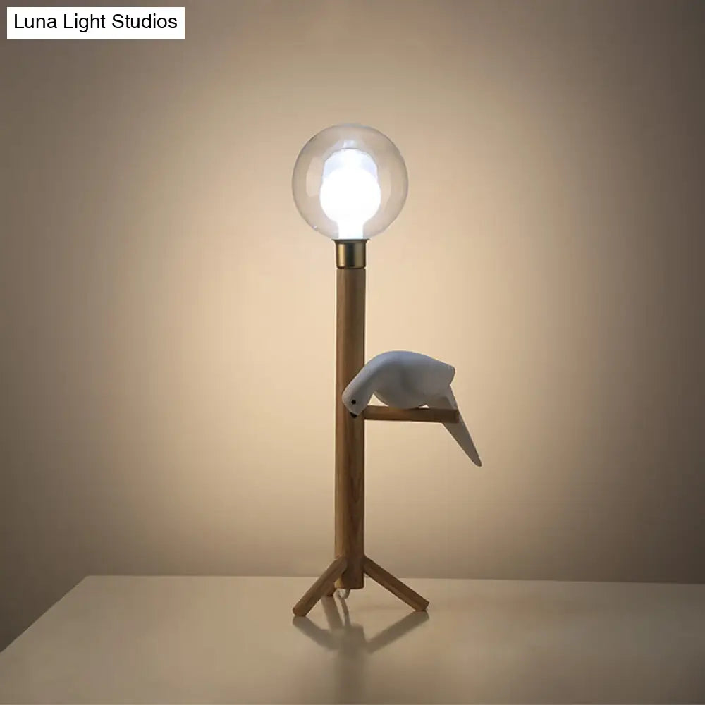 Modernist Wood Table Lamp With Clear Glass Sphere Night Light And Bird Decoled