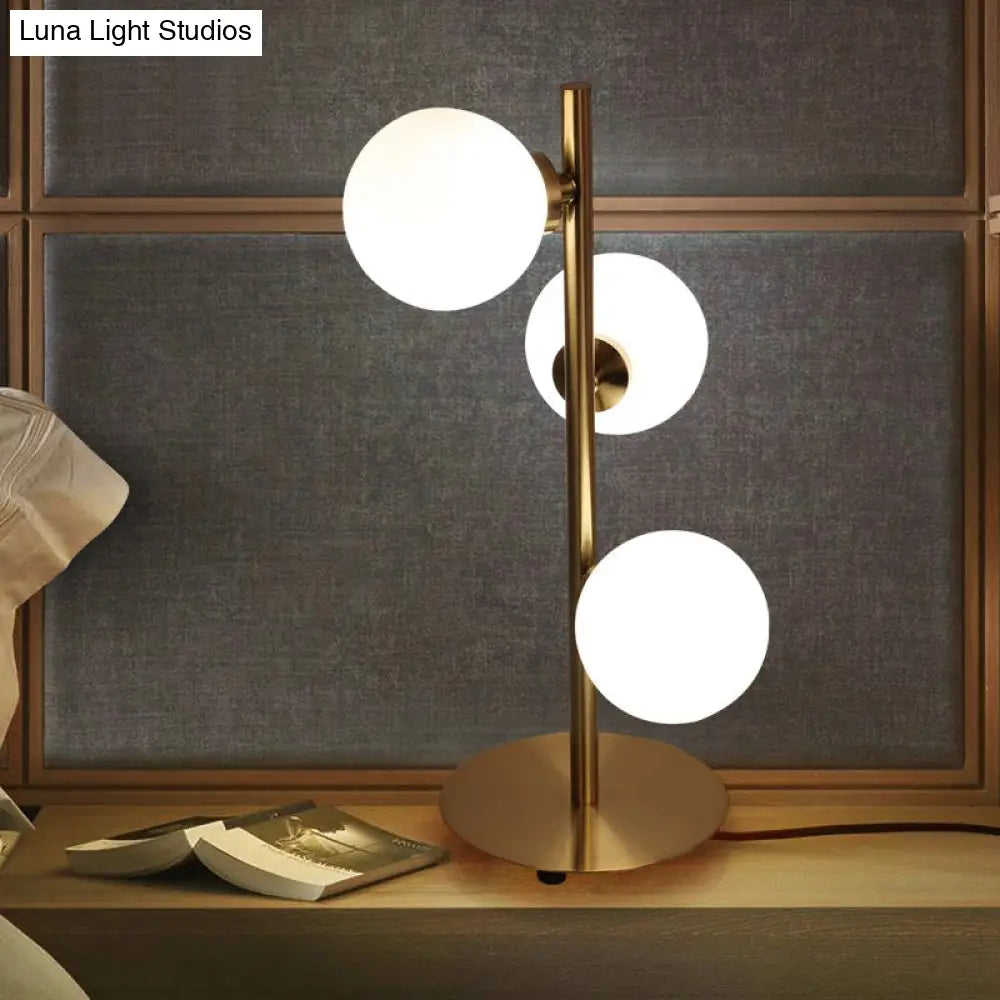 Post-Modern Gold Table Lamp Set With Globe White Glass Shades - Of 3 Lights