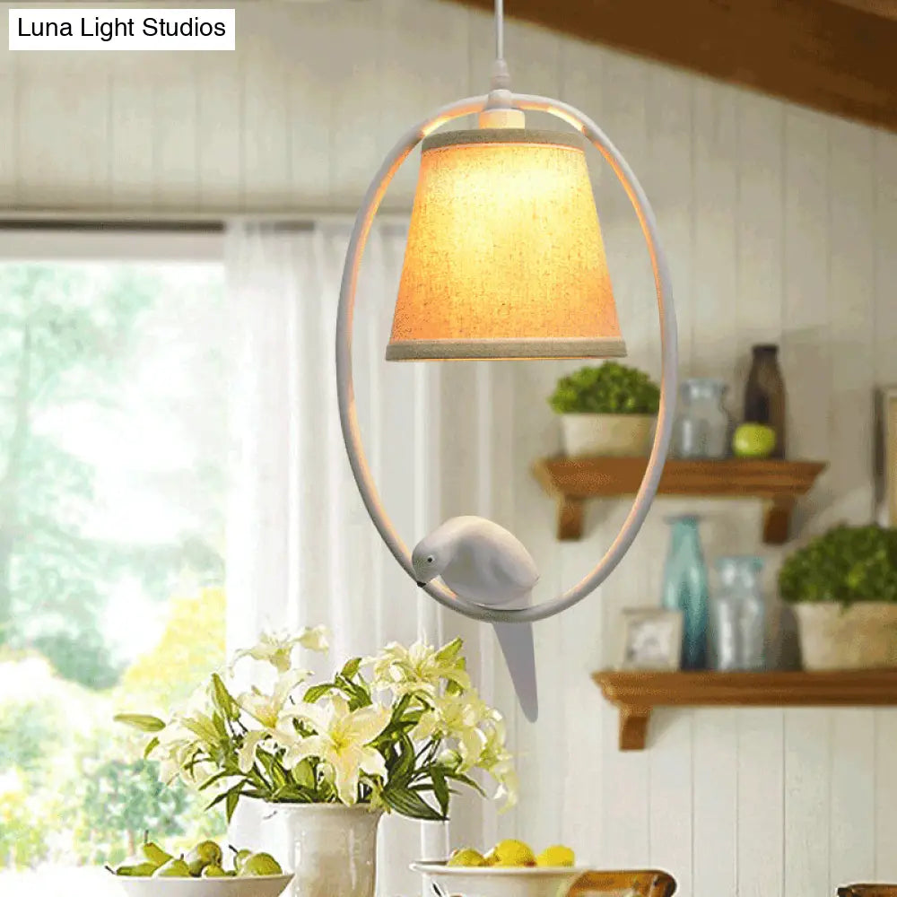 Rustic Beige Pendant Light With Bird Accent - Stylish Oval Metal Ceiling For Hotels
This Improved