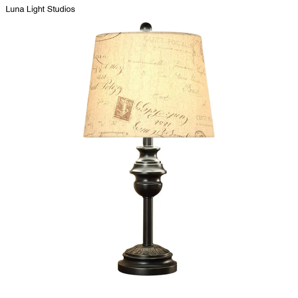 Rustic Tapered Drum Table Night Light With Single Bulb - Elegant Black Script Printed Fabric