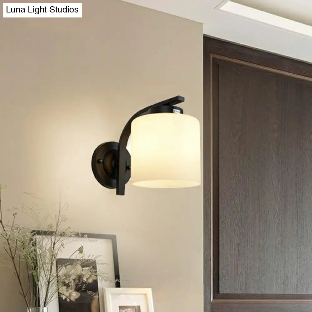 Sleek White Glass Wall Sconce With Black Accents For Living Room