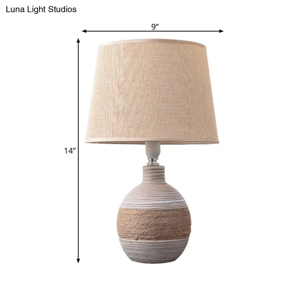 Traditional Flaxen/Grey Nightstand Lamp With Ceramic Base - 1-Light Fabric Drum Desk Light