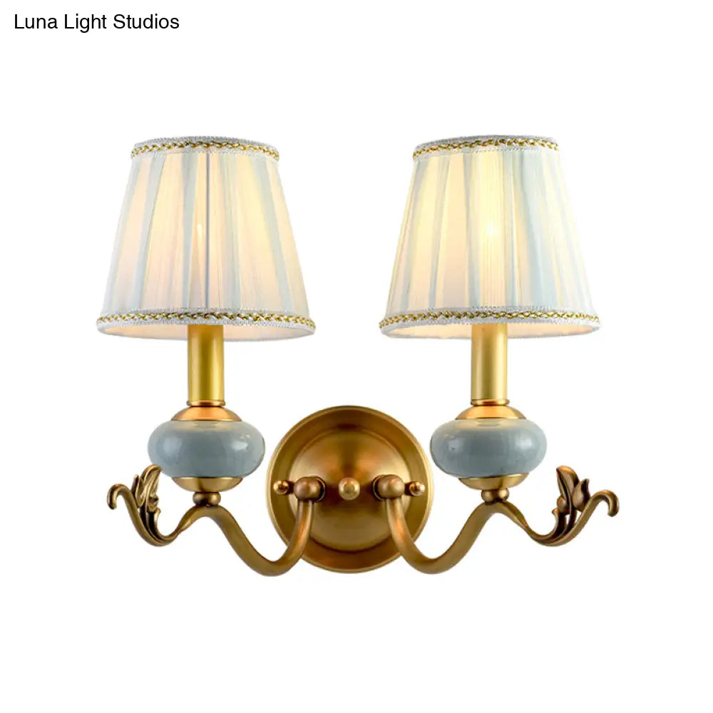 Traditional Style Brass Wall Sconce With Curved Arm Fabric Shade