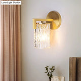 1-Light Brass Wall Mount For Bedroom With Cylinder Rippled Glass