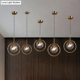 1-Light Glass Ball Pendant Ceiling Fixture with Ring Frame - Post-Modernist Design