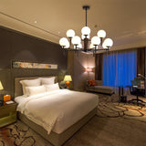 Contemporary Black And Gold Globe Chandelier With Radiant Design Milk Glass Shades - Available In 6
