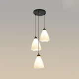 Simplicity Black Swirl Drop Pendant With White Glass Ruffled Cluster