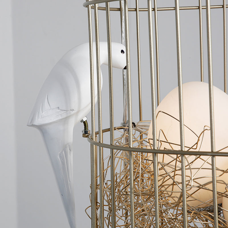 Rustic Matte White Glass Egg Shaped Chandelier With Bird And Birdcage - 3 Light Hanging Fixture