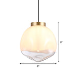 Modern Globe Pendant Light With Dimpled Glass In White And Clear Brass Finish
