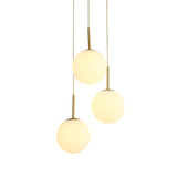 Modern White Glass Orb Hanging Ceiling Light With 3 Lights And Brass Finish