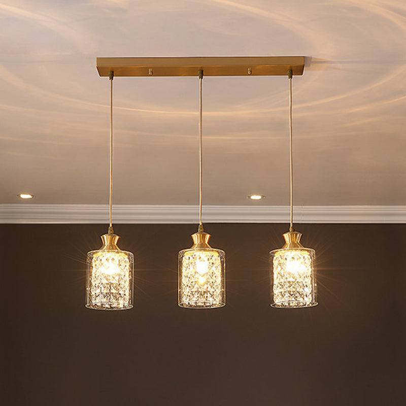 Modernist Gold Pendant Lamp With Faceted Crystal And Clear Glass Shade - 3 Heads
