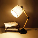 Adjustable Wood Arm Black Desk Light: Simple Cylinder Fabric Table Lamp For Bedroom - 1 Light