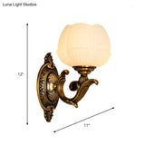 Antiqued Brass Flower Bud Milk Glass Wall Lamp - 1-Head Bedroom Sconce