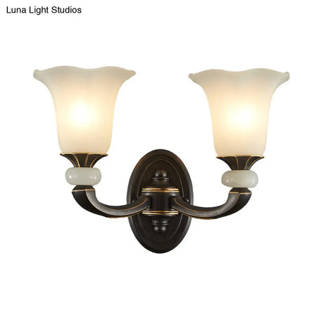 Antiqued Flower Wall Light Fixture - Black And Gold Frosted Glass Mounted Lamp
