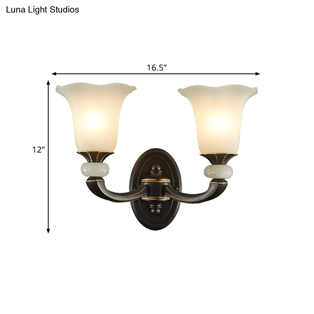 Antiqued Flower Wall Light Fixture - Black And Gold Frosted Glass Mounted Lamp