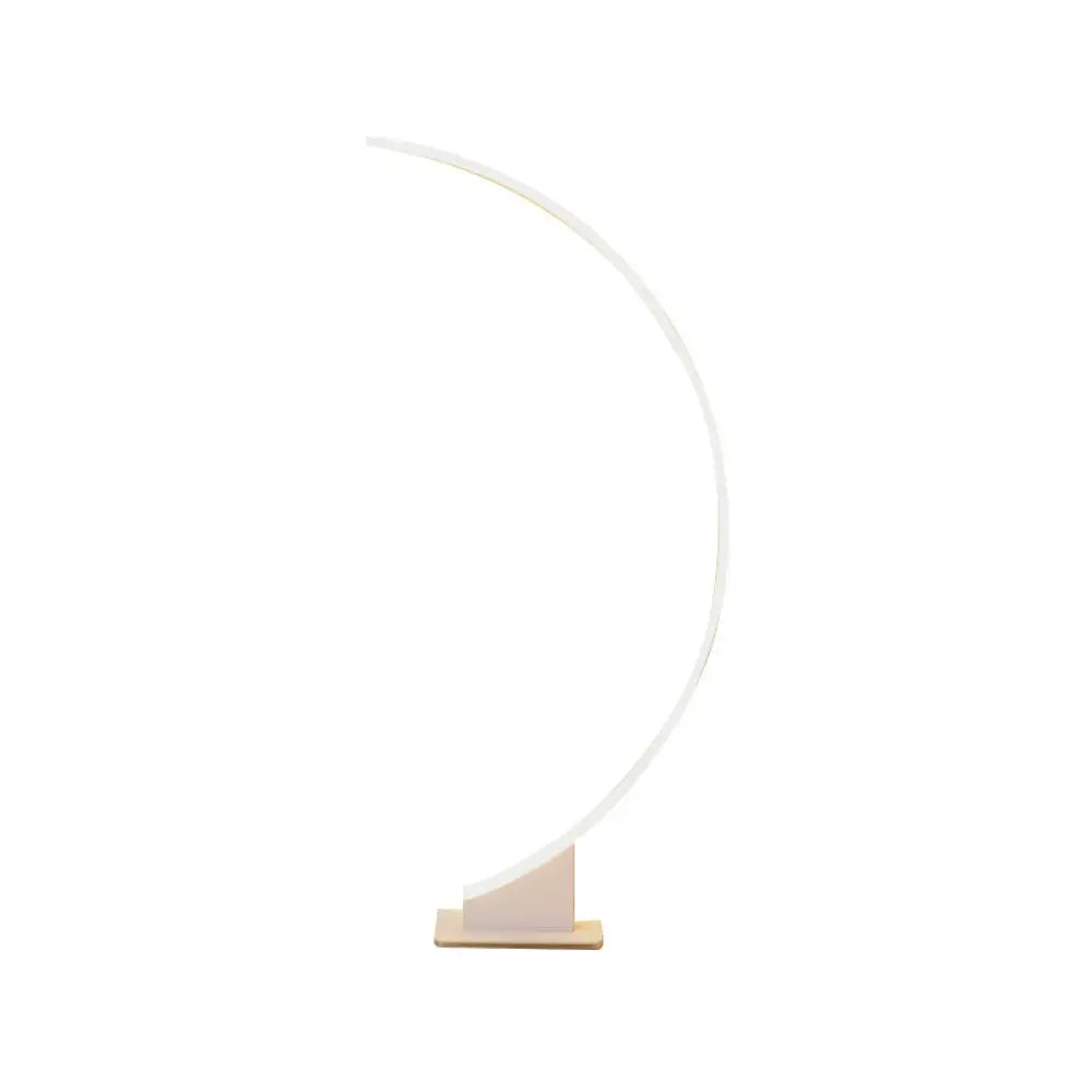 Arched Shape Led Floor Lamp In White For A Simplistic Metallic Living Room Look