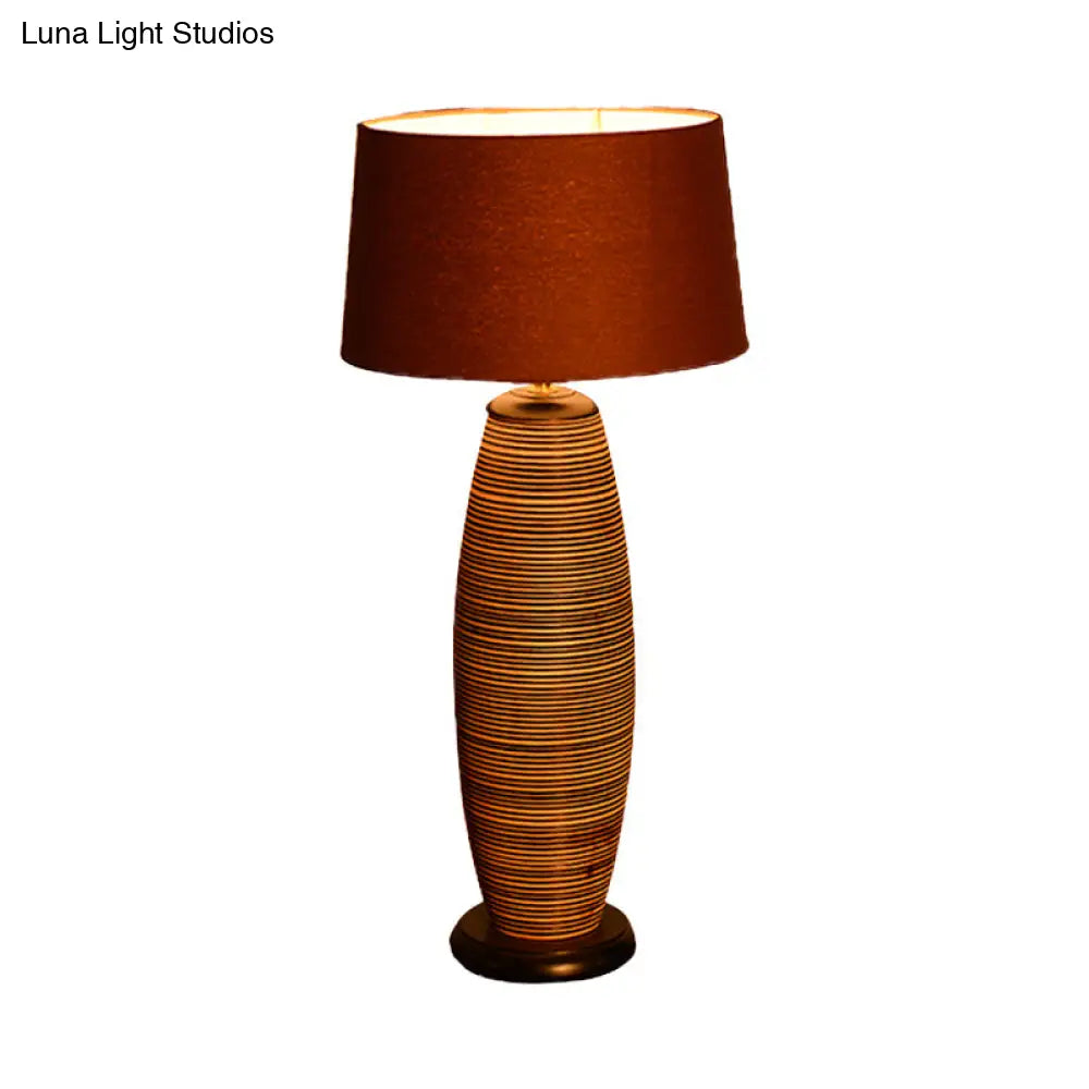 Asia Wood Small Desk Lamp With Oval Task Lighting Coffee Color And Fabric Drum Shade