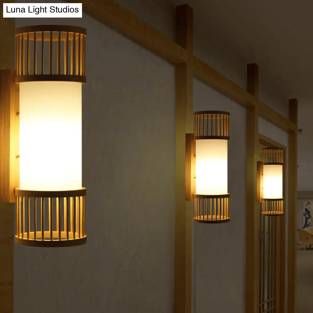 Asian Bamboo Cylinder Shade Wall Sconce Light In Beige - Stylish 1-Head Lamp For Stairway