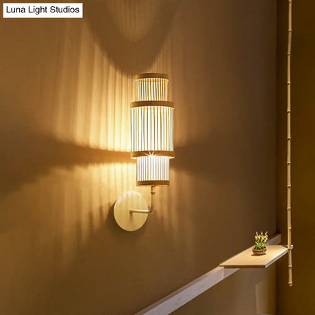 Asian Style Bamboo Wall Lamp Cylinder Fixture Single Bulb Wood Lighting With Curved Arm Ideal For