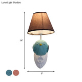 Bird Wall Mount Light Cartoon 1 Head Resin Sconce Lamp With Pink/Blue Color Cone Brown Fabric Shade