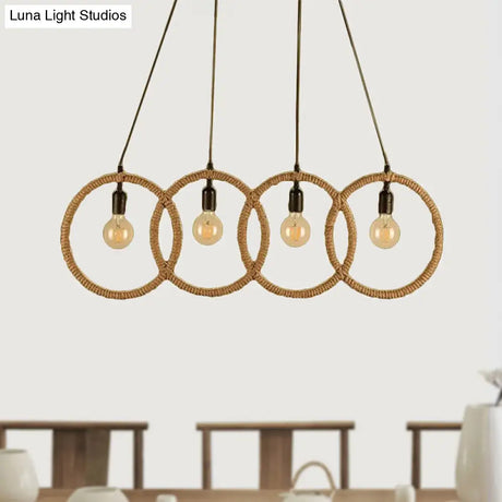 Black Finish Lodge Style Four-Ring Pendant Light With Manila Rope - 4 Lights For Coffee Shop