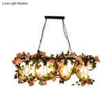Black Metal 4-Light Linear Island Lamp With Hanging Artificial Plant - Lodge Style