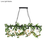 Black Metal 4-Light Linear Island Lamp With Hanging Artificial Plant - Lodge Style