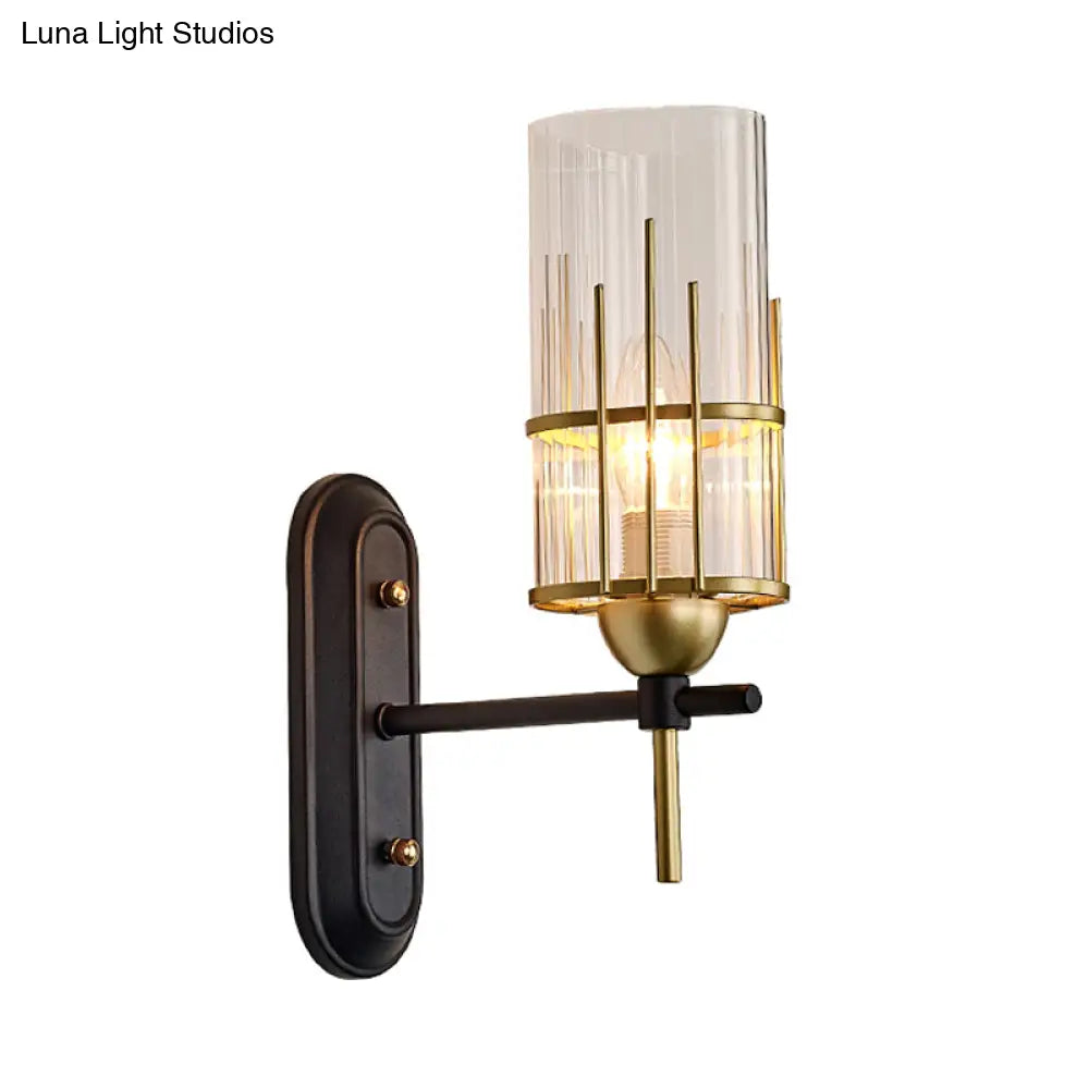 Black Metal Wall Sconce With Clear Glass Shade For Bedside Lighting