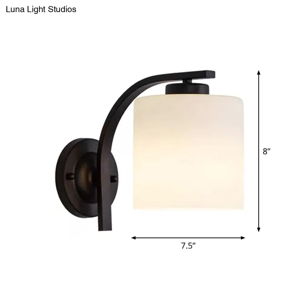 Black Wall Sconce With Ivory Glass Cylinder And Curved Arm - 1-Light Mounted Lamp