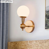 Brass Orb Wall Mount Light With Opal Glass Lampshade - Mid Century Lighting Idea