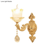 Brass Wall Mount Sconce With Scrolled Arms Glass Blossom Shade And Crystal Accents