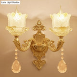 Brass Wall Mount Sconce With Scrolled Arms Glass Blossom Shade And Crystal Accents