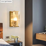 Brass Wall Sconce With Clear Crystal Shield For A Mid Century Look