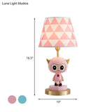 Cartoon Cow Boy Night Lamp With Triangle Print Shade In Pink/Blue - Resin Table Lighting