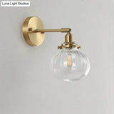 Champagne/Clear Prismatic Glass Single Sconce Gold Wall Light - Minimalist Globe Design