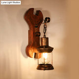 Coastal Clear Glass Lantern Sconce Light With Wooden Backplate - Rustic One-Light Fixture
