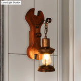 Coastal Clear Glass Lantern Sconce Light With Wooden Backplate - Rustic One-Light Fixture