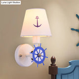 Coastal Metallic Wall Mounted Sconce With Wheel Rudder Design White-Blue Fixture & Fabric Shade